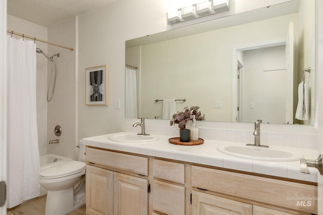4335 W Quail Ridge Dr, Boise, ID 83703 - full bath featuring double vanity and shower / bath combination with curtain