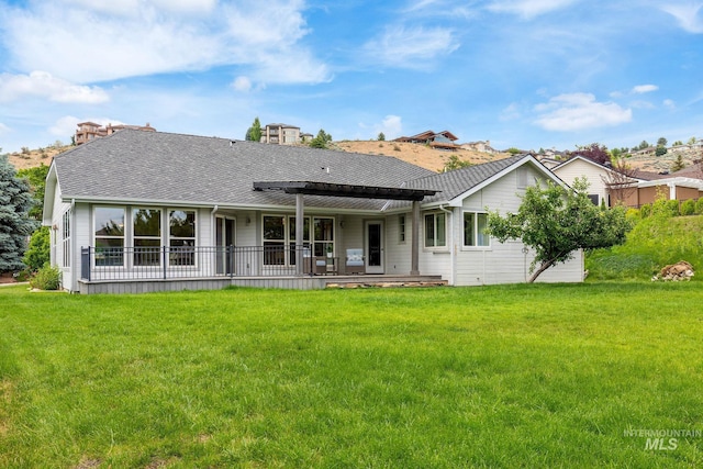 4335 W Quail Ridge Dr, Boise, ID 83703 - rear view of property with a patio, a lawn, and a shingled roof