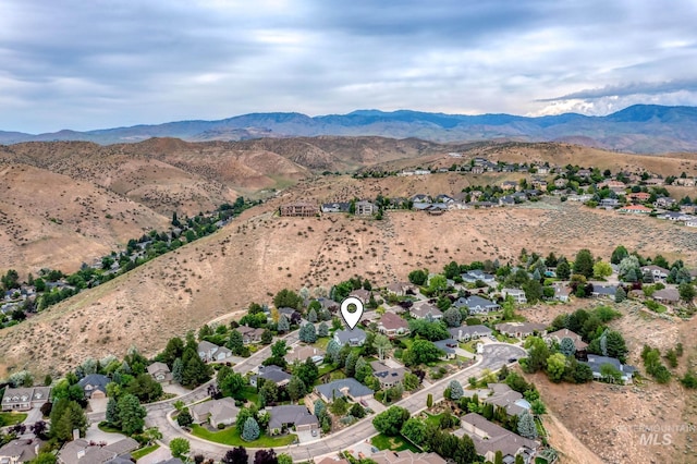 4335 W Quail Ridge Dr, Boise, ID 83703 - aerial overview of property's location with a mountainous background and a desert landscape