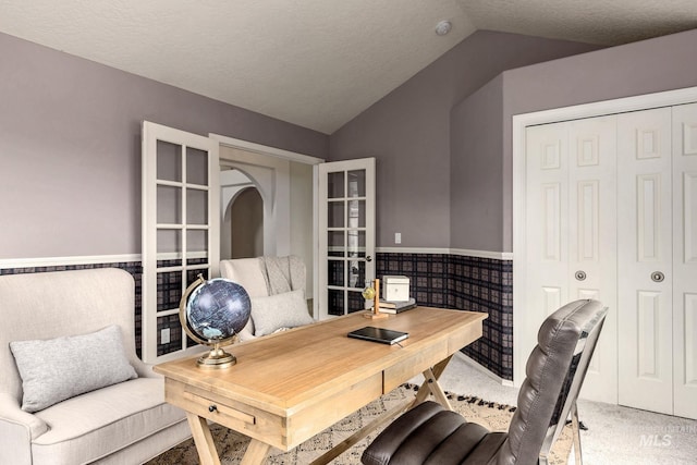 4335 W Quail Ridge Dr, Boise, ID 83703 - office area with lofted ceiling, a wainscoted wall, and light carpet