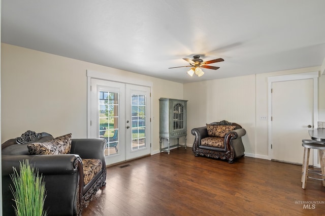 living area featuring ceiling fan, visible vents, french doors, and wood finished floors