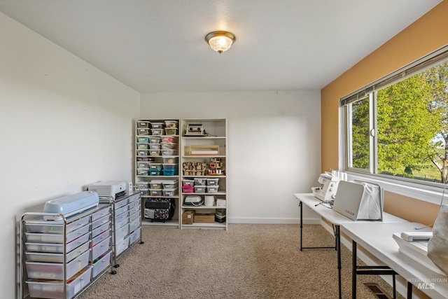 carpeted office with baseboards