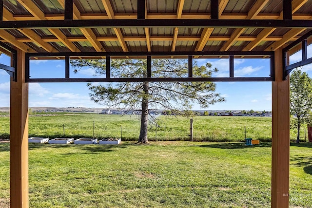 view of yard with a rural view