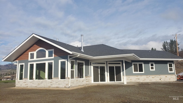 back of property featuring a patio area