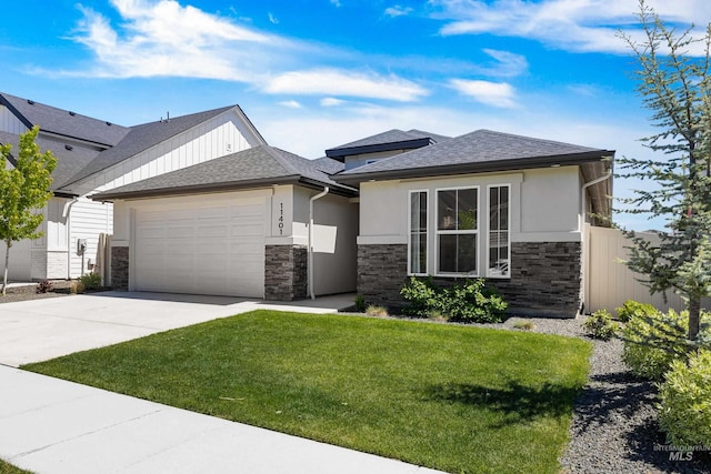 view of front of house featuring stone siding, a garage, driveway, a front yard, and stucco siding