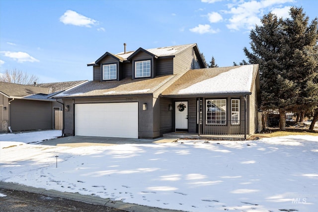 traditional-style home featuring a garage