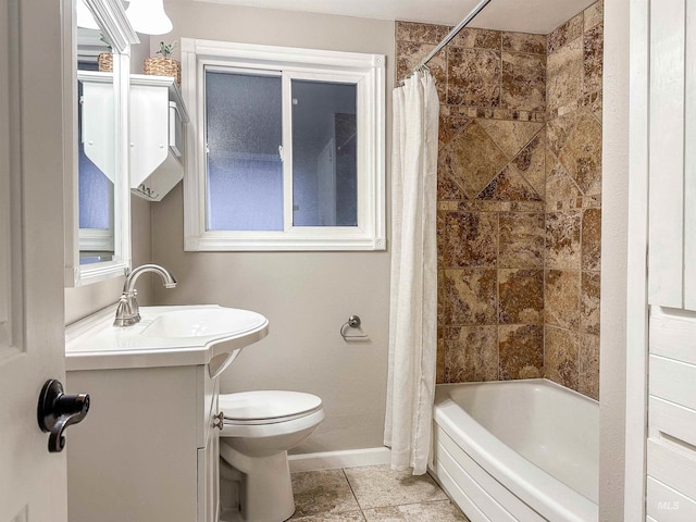 full bathroom featuring tile patterned flooring, vanity, toilet, and shower / bath combo