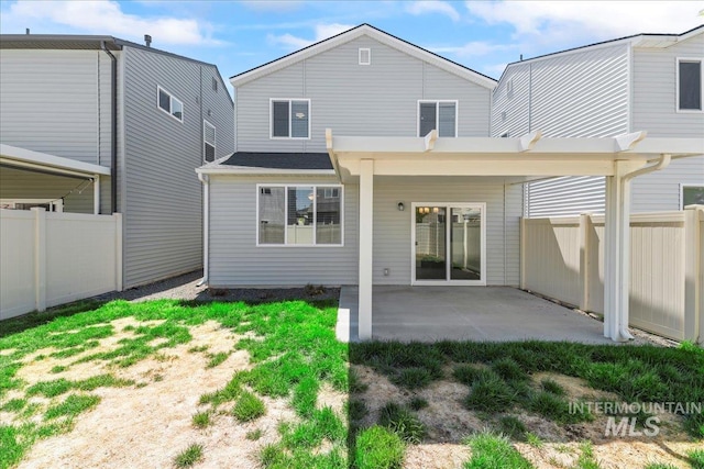 4084 E Blueberry St, Meridian, ID 83642 - back of house with fence and a patio