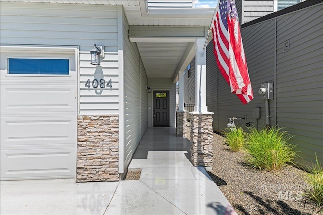 4084 E Blueberry St, Meridian, ID 83642 - property entrance featuring stone siding and covered porch