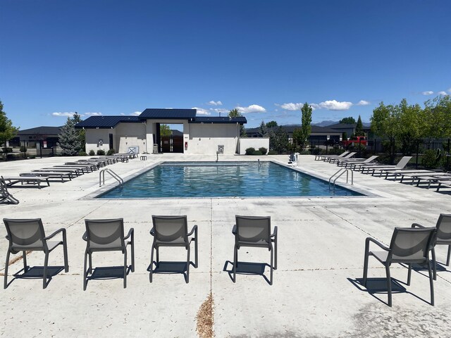 4084 E Blueberry St, Meridian, ID 83642 - community pool featuring fence and a patio