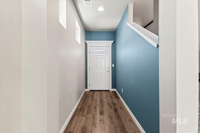 4084 E Blueberry St, Meridian, ID 83642 - doorway with wood finished floors and baseboards