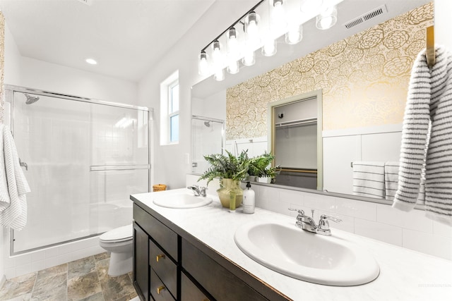 full bath featuring a sink, visible vents, and a stall shower