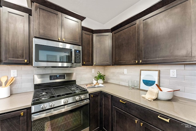 kitchen with light countertops, tasteful backsplash, appliances with stainless steel finishes, and dark brown cabinetry