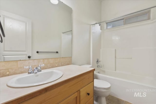 1280 W Bacall St, Meridian, ID 83646 - bathroom with vanity, toilet, and shower / bathtub combination