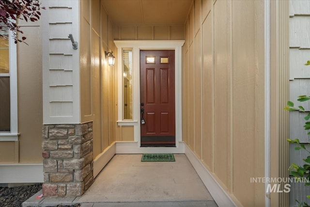 1280 W Bacall St, Meridian, ID 83646 - view of exterior entry with board and batten siding and stone siding