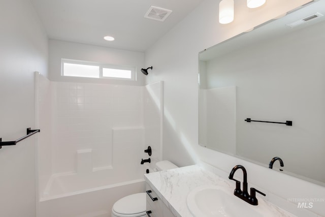 full bathroom with vanity, bathtub / shower combination, and toilet