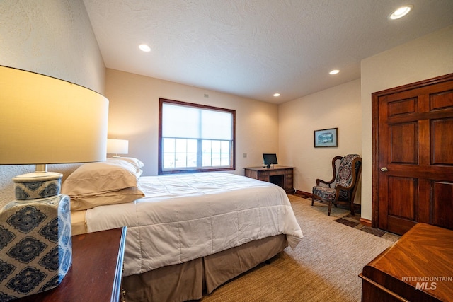 186 Ridgeview Dr, Grangeville, ID 83530 - bedroom with light colored carpet, baseboards, and recessed lighting
