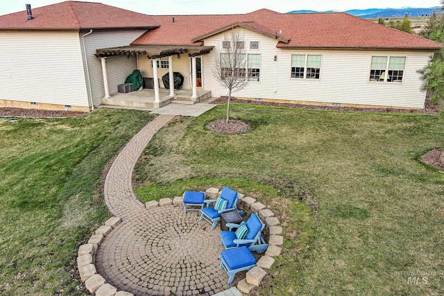 186 Ridgeview Dr, Grangeville, ID 83530 - back of house featuring a pergola, a patio area, a yard, and crawl space