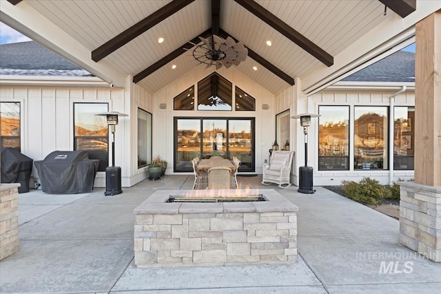 view of patio / terrace featuring ceiling fan, an outdoor fire pit, and area for grilling