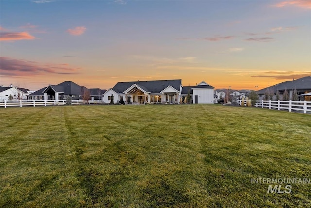 view of front facade featuring a lawn