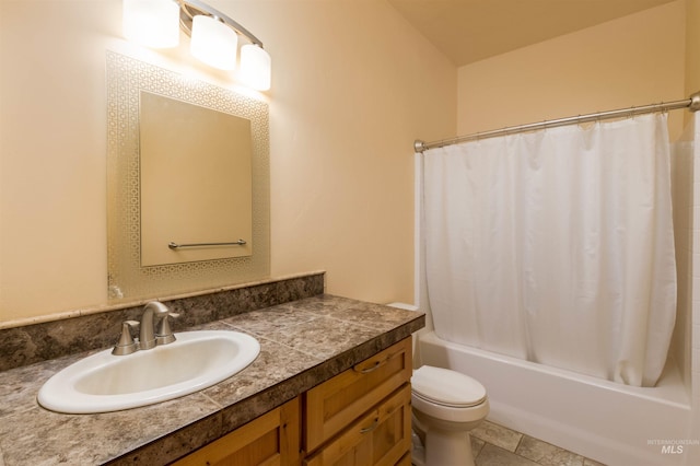 bathroom with toilet, vanity, and shower / tub combo with curtain