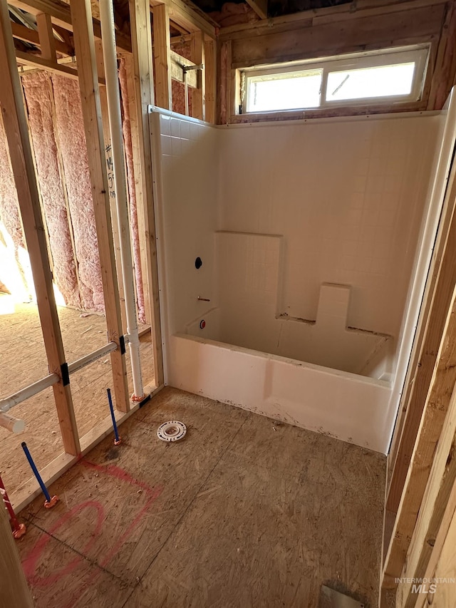 bathroom with a washtub