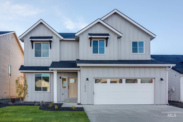 modern farmhouse style home featuring a garage