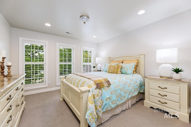 2417 E Brigantine Ct, Eagle, ID 83616 - bedroom featuring light colored carpet, multiple windows, baseboards, and recessed lighting