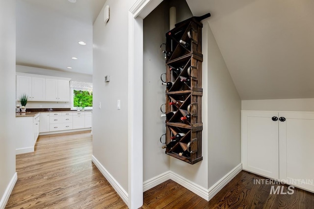 2417 E Brigantine Ct, Eagle, ID 83616 - corridor featuring light wood-type flooring, baseboards, and recessed lighting