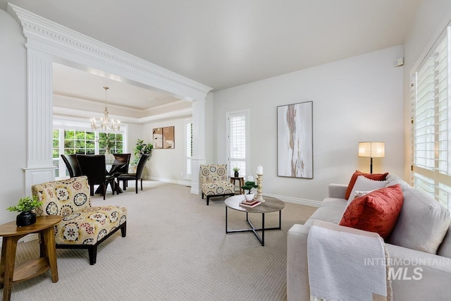 2417 E Brigantine Ct, Eagle, ID 83616 - living area featuring a chandelier, carpet floors, baseboards, and a raised ceiling