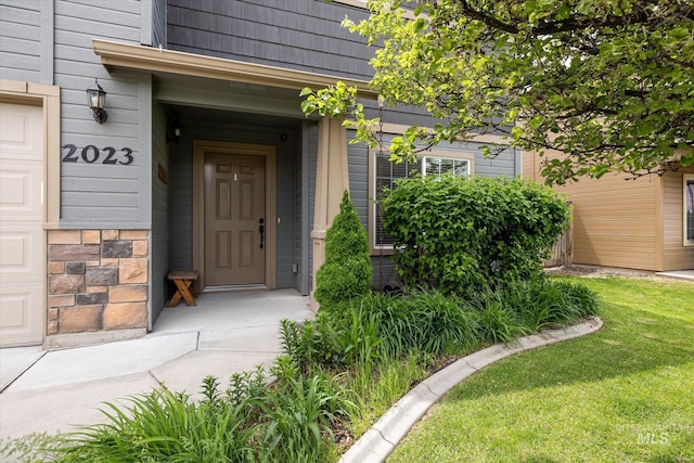 2023 E Wrightwood Dr, Meridian, ID 83642 - entrance to property featuring a lawn