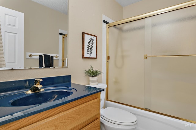 11610 W Lanktree Gulch Rd, Star, ID 83669 - full bathroom with toilet, vanity, and combined bath / shower with glass door