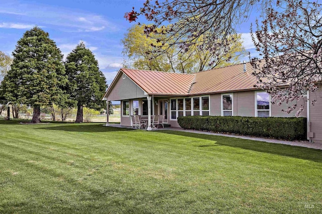 11610 W Lanktree Gulch Rd, Star, ID 83669 - ranch-style house with metal roof and a front yard