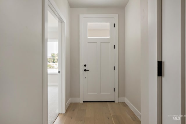 entryway with light hardwood / wood-style flooring