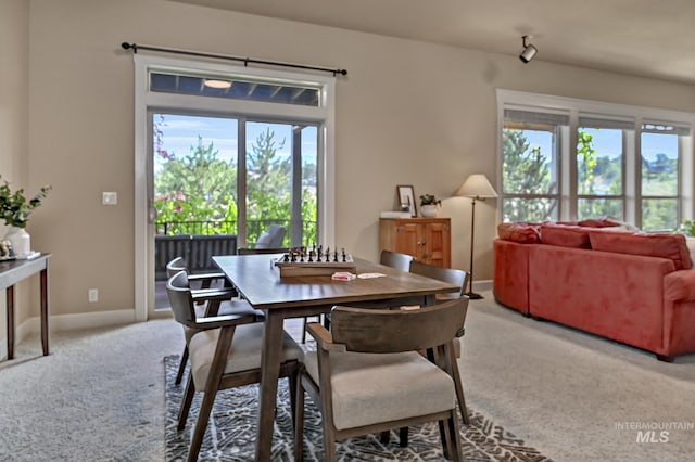 352 N Panorama Pl, Boise, ID 83702 - carpeted dining room featuring healthy amount of natural light