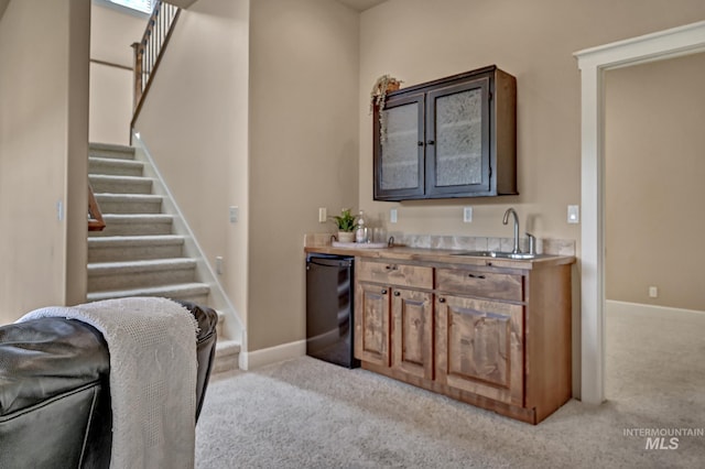 352 N Panorama Pl, Boise, ID 83702 - indoor wet bar featuring refrigerator, light carpet, and stairs