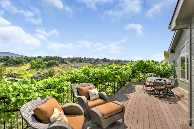 352 N Panorama Pl, Boise, ID 83702 - wooden deck featuring outdoor dining area