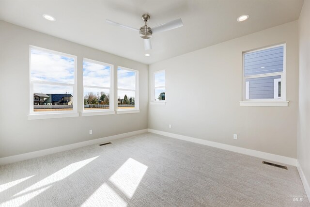 2330 E Monhegan Dr, Eagle, ID 83616 - carpeted spare room featuring ceiling fan, recessed lighting, and baseboards