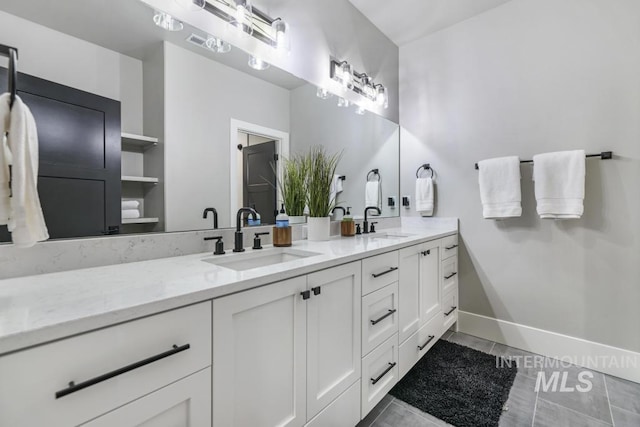 bathroom featuring vanity and tile patterned floors