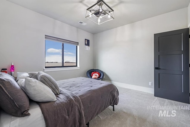 bedroom featuring carpet