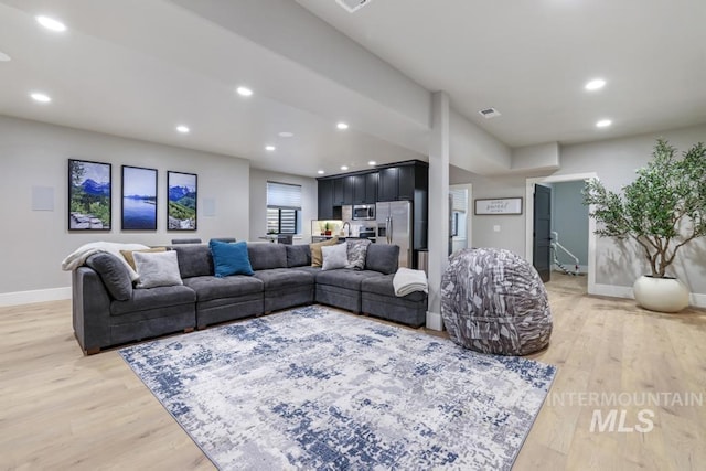 living room featuring light hardwood / wood-style flooring