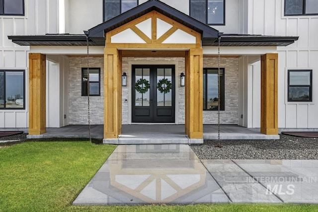 doorway to property with french doors