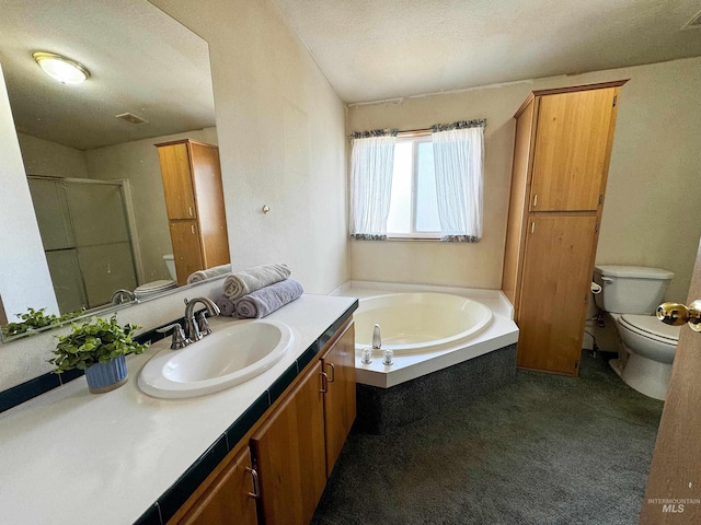 664 Lawrence Ln, Weiser, ID 83672 - bathroom featuring toilet, vanity, a shower stall, a bath, and a textured ceiling