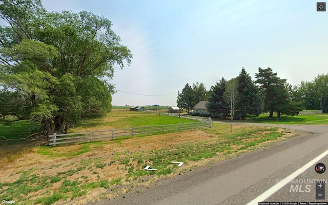 view of road with a rural view