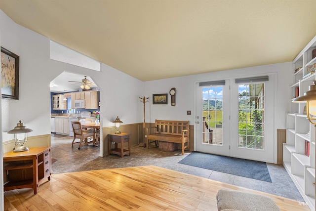 1745 Gibler Rd, Kamiah, ID 83536 - entrance foyer with ceiling fan, lofted ceiling, light wood-type flooring, and arched walkways