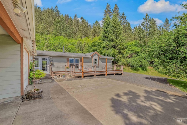 1745 Gibler Rd, Kamiah, ID 83536 - view of car parking featuring a forest view