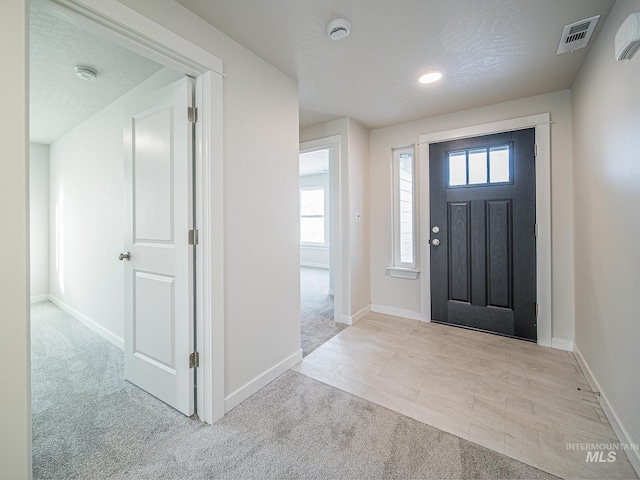 2314 E Cave Falls St, Kuna, ID 83634 - carpeted foyer entrance with baseboards