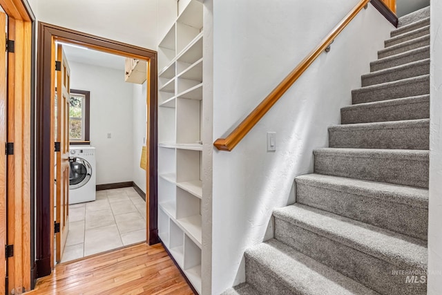 4997 N Brookside Ln, Boise, ID 83714 - staircase with washer / dryer and wood finished floors