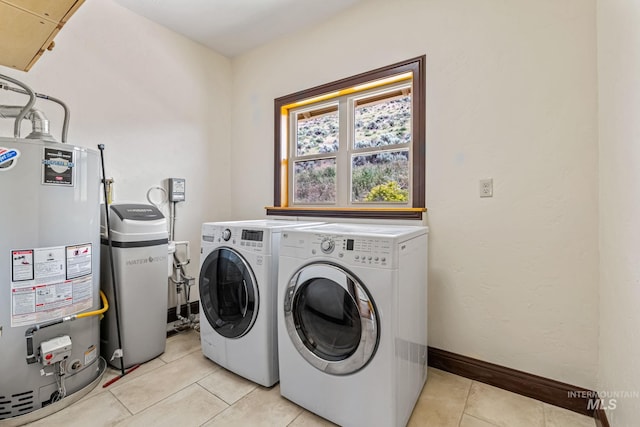 4997 N Brookside Ln, Boise, ID 83714 - washroom featuring gas water heater, independent washer and dryer, and light tile patterned floors
