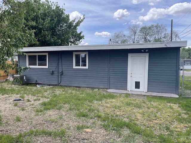 825 S 12th E, Mountain Home, ID 83647 - rear view of house featuring cooling unit